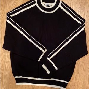 Q2 collection black and white sweater.